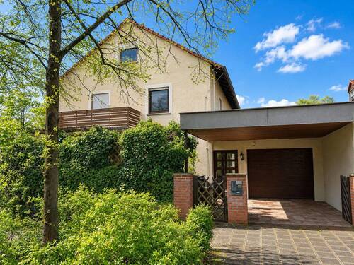 Hausansicht mit Garage - Gepflegtes freistehendes Einfamilienhaus mit Garten & Wintergarten - Fürth-Unterfarrnbach