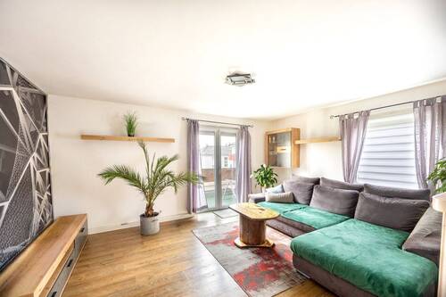 Wohnzimmer - 1 Zimmer Mehrfamilienhaus, Wohnhaus in Ludwigsburg