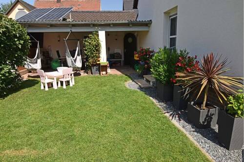 Terrasse mit dirktem Zugang vom Haus - Einfamilienhaus mit 115,00 m² in Poppenricht zum Kaufen