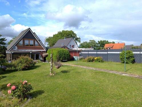 Rückansicht und Garten - 5 Zimmer Einfamilienhaus zum Kaufen in Münsterdorf