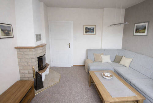 Wohnzimmer m. Kamin im 1. OG - 