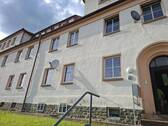 Wohnung im EG links - 