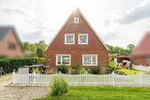 Bild 2 - 6 Zimmer Einfamilienhaus zum Kaufen in Wangerland