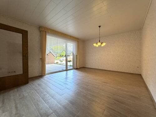 Wohnzimmer - Einfamilienhaus mit 194,00 m&sup2; in Wardenburg / Achternmeer zum Kaufen