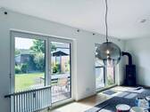 Der Wohnraum mit Zugang zum Garten - 