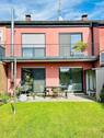 Die Rückansicht mit Terrasse und Balkon - 4 Zimmer Reihenmittelhaus zur Miete in Speicher