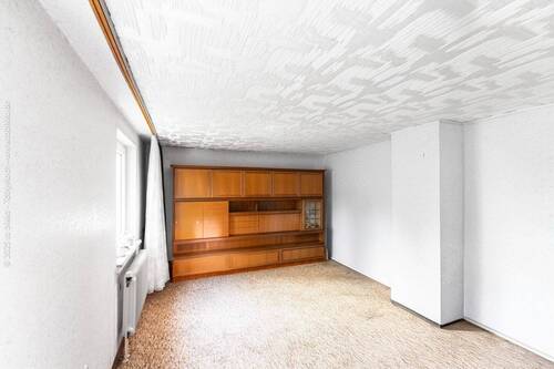 Wohnzimmer - Einfamilienhaus mit 107,40 m² in Neu-Isenburg zum Kaufen