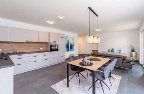 Wohnen/Kochen/Essen - Zentrumsnahe 3,5-Zimmer-Neubauwohnung mit Dachterrasse