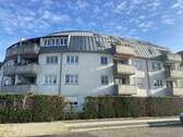 Hausansicht - Schöne Eigentumswohnung mit Terrasse, Garten und Tiefgaragenstellplatz, Vermietet