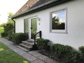 Nordseite mit Eingang - Einfamilienhaus mit 110,00 m² in Tolk zum Kaufen