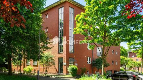 Außenansicht 2 - Helle 3-Zimmer-Wohnung mit Süd-Loggia, Fußbodenheizung & moderner EBK in Mühlheim