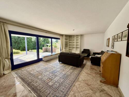 Wohnzimmer - Bungalow mit 191,60 m&sup2; in Lage zum Kaufen