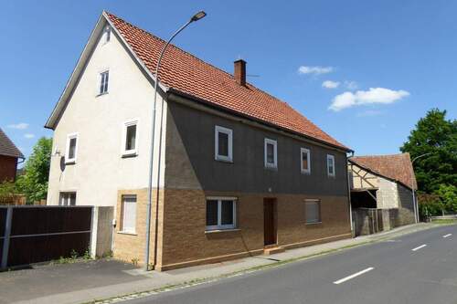 Hausansicht - 9 Zimmer Einfamilienhaus zum Kaufen in Oberstreu-Mittelstreu