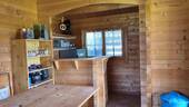 Blockhaus mit Tresen und Bar - 