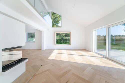 Wohnbereich mit Galerie und Sitzfenster - Einfamilienhaus mit 293,20 m² in Starnberg / Söcking zum Kaufen