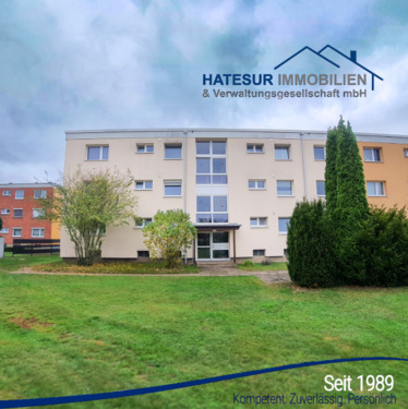 Titelbild - Vermietete 4-Zimmer-Wohnung mit Balkon und Garage in Stolzenau zu verkaufen