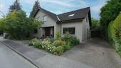 Seitenansicht - Viel Platz zum Wohnen und Wohlfühlen - Einfamilienhaus mit Einliegerwohnung