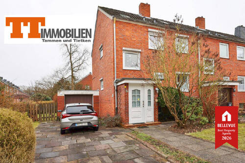 Außenansicht - TT bietet an: Solides Reihenendhaus mit 5 Zimmern, Garage und Südterrasse in begehrter Lage von Altengroden!