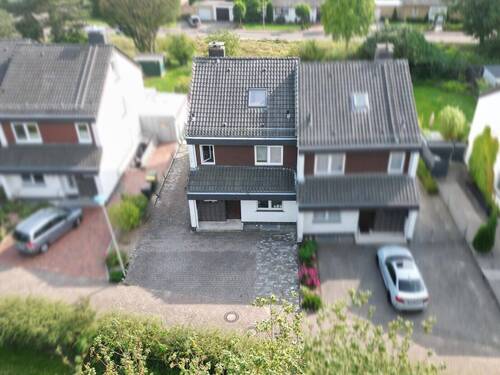 Bild 2 - 5 Zimmer Einfamilienhaus zum Kaufen in Espelkamp