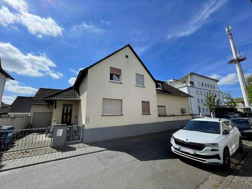 4 Wohnungen und 1 Gewerbeeinheit - 9 Zimmer Mehrfamilienhaus, Wohnhaus zum Kaufen in Langen