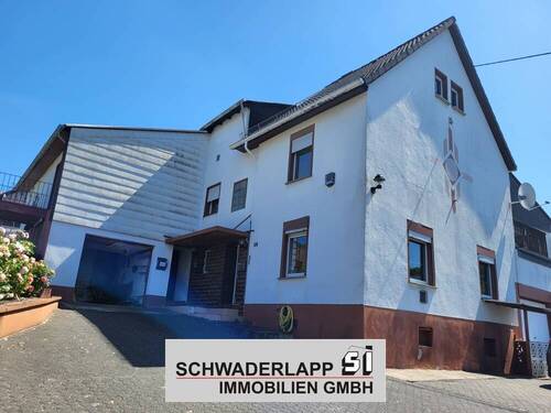 01_Seitenansicht - Einfamilienhaus mit Einliegerwohnung in Hillscheid