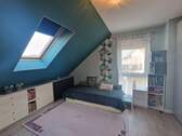Zimmer im Dachgeschoss - 