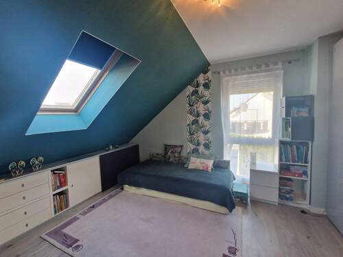 Zimmer im Dachgeschoss - 