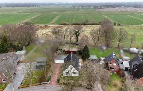 Luftbild - 5 Zimmer Einfamilienhaus zum Kaufen in Wesseln