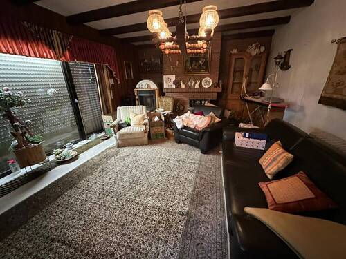 Kaminzimmer - Bungalow mit 143,00 m&sup2; in Ostrhauderfehn zum Kaufen