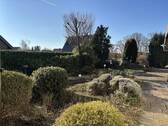 Blick von der Terrasse am Wohnbereich - Bungalow mit 156,00 m² in Gütersloh zum Kaufen