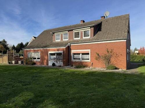 Bild 1 - Teilmodernisiertes Zweifamilienhaus mit Werkstatt und Doppelgarage