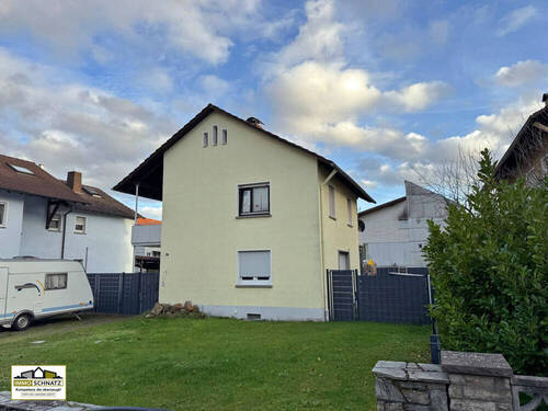 Ansicht - Charmantes Einfamilienhaus in Erlenbach mit Garten und Garage