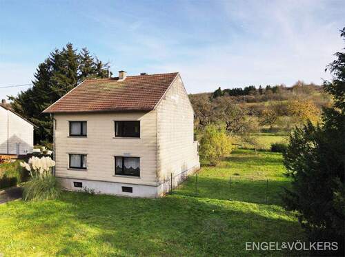 Bild 1 - Großzügiges Einfamilienhaus mit Baugrundstück in ruhiger Endlage!
