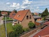 Ansicht Süd-West - 5 Zimmer Mehrfamilienhaus, Wohnhaus zum Kaufen in Eystrup