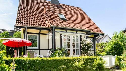 Außenansicht 3 - Lichtdurchflutetes Wohngefühl & zwei Terrassen für jede Tageszeit