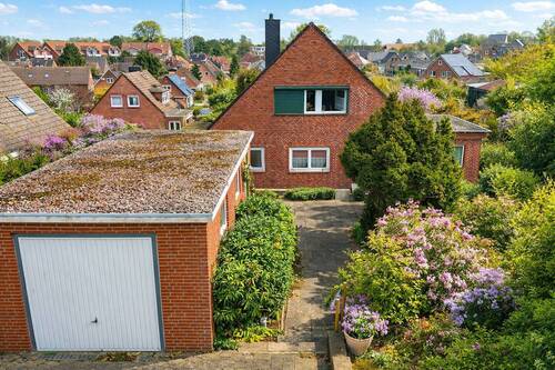 Visualisierung: Sommeransicht - 5 Zimmer Einfamilienhaus zum Kaufen in Heiligenhafen