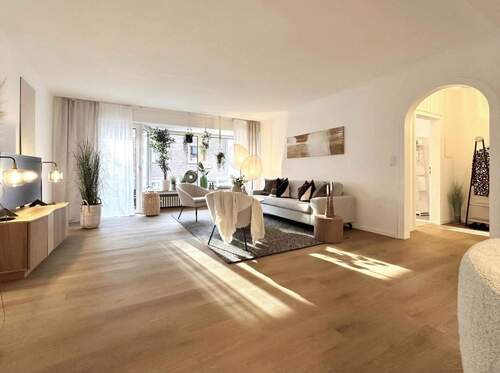 Wohnzimmer - Einziehen und wohlfühlen - Stilvoll sanierte Wohnung mit Balkon & Gartenblick