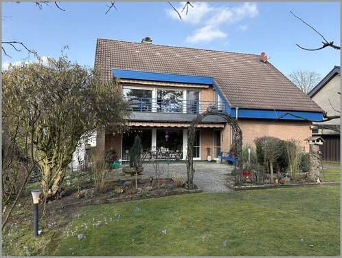 Hausansicht von hinten - 9 Zimmer Einfamilienhaus zum Kaufen in Bad Laer