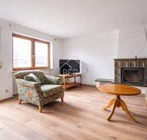 Großzügige Eigentumswohnung mit zwei Garagen in zentraler Lage - Michelbach an der Bilz