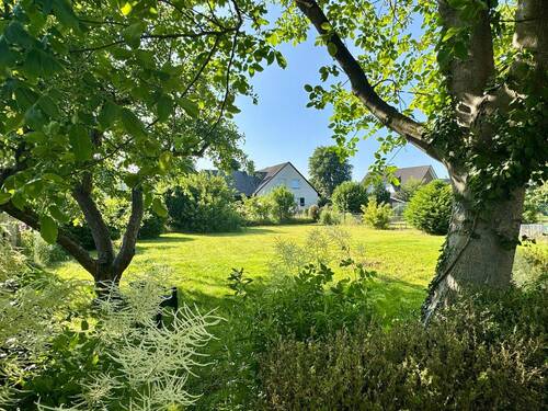 Gartenansicht - Mehrfamilienhaus, Wohnhaus mit 171,00 m&sup2; in Wunstorf zum Kaufen