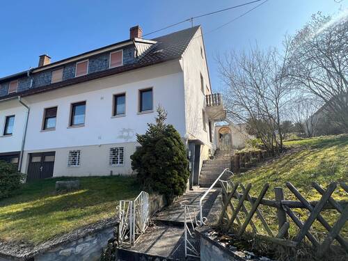 Vorderansicht - Top-Gelegenheit! Doppelhaushälfte mit 2 Wohnungen und Gartengrundstück in Monzingen zu verkaufen.