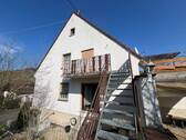 Seitenansicht mit separter Treppe in 2.OG - Einfamilienhaus mit 190,00 m² in Monzingen zum Kaufen