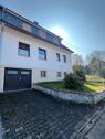 Vorderansicht mit Garage - 