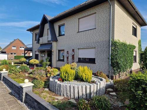 Ansicht2 - 8 Zimmer Mehrfamilienhaus, Wohnhaus zum Kaufen in Esterwegen