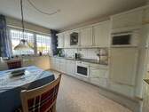Küche mit kleinem Essplatz - Reihenmittelhaus mit 126,00 m² in Düren zum Kaufen