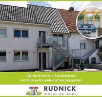RUDNICK bietet 3-Familienhaus mit Blick aufs Landschaftsschutzgebiet - Wunstorf Großenheidorn