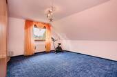 Schlafzimmer im Dachgeschoss - 