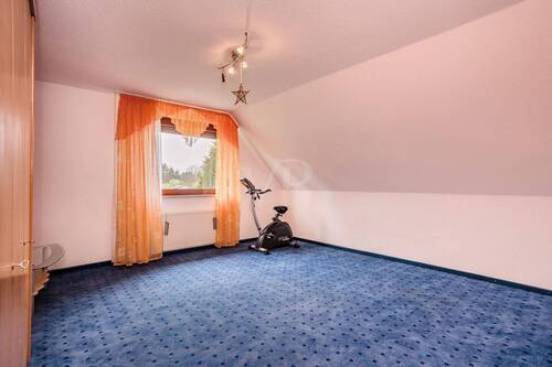 Schlafzimmer im Dachgeschoss - 