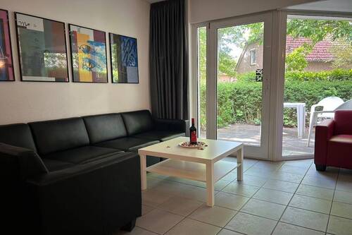 Wohn- und Esszimmer - Mehrfamilienhaus, Wohnhaus mit 66,00 m² in Butjadingen zum Kaufen