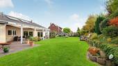 Außenansicht 2 - Traumhaftes Einfamilienhaus im Bungalow-Stil mit 4 Zimmern und Gartenparadies - Perfekt für Familien